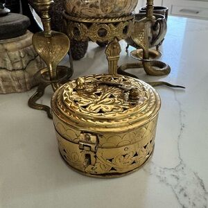 Little vintage brass embossed cricket box. Stash box